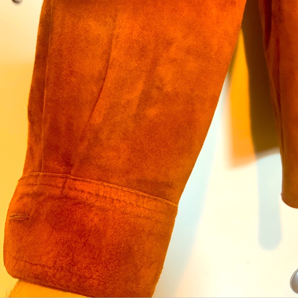 Stuart Norman reversible butter leather jacket , removable buttons .